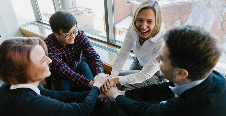 small group of audiologists in a team building meeting